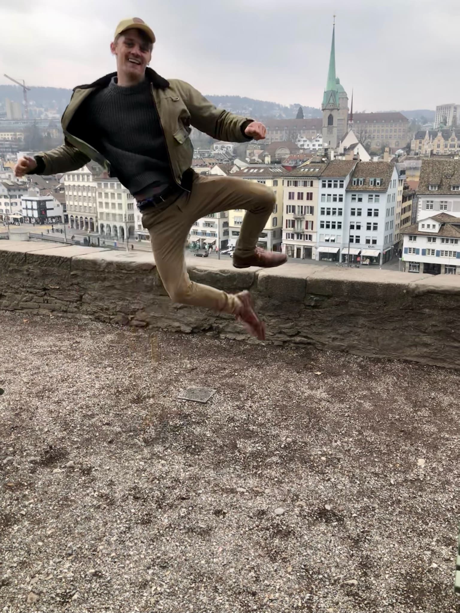 picture of Chris jumping in front of Zurich
